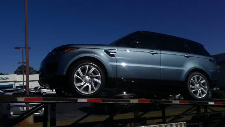 range rover on open trailer
