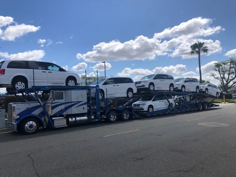 dodge shipping a fleet of vehicles with an open carrier