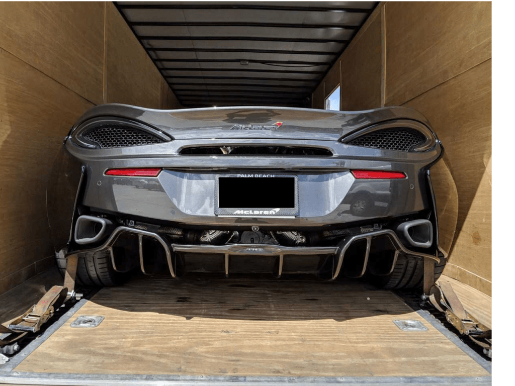 mclaren in enclosed trailer