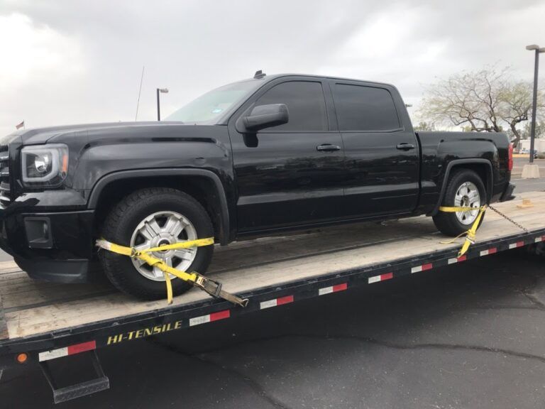 GMC Sierra on flatbed