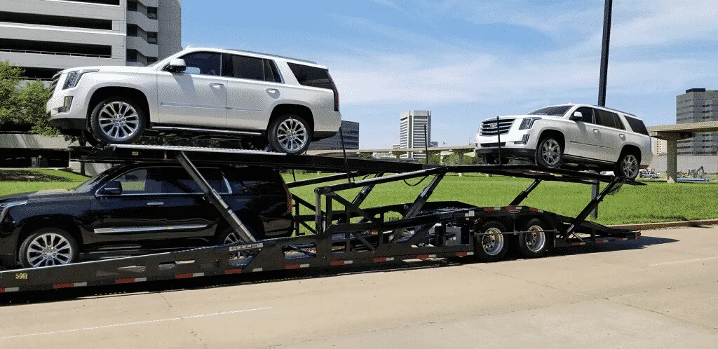 fleet of 2021 cadillac sub hauled on trailer