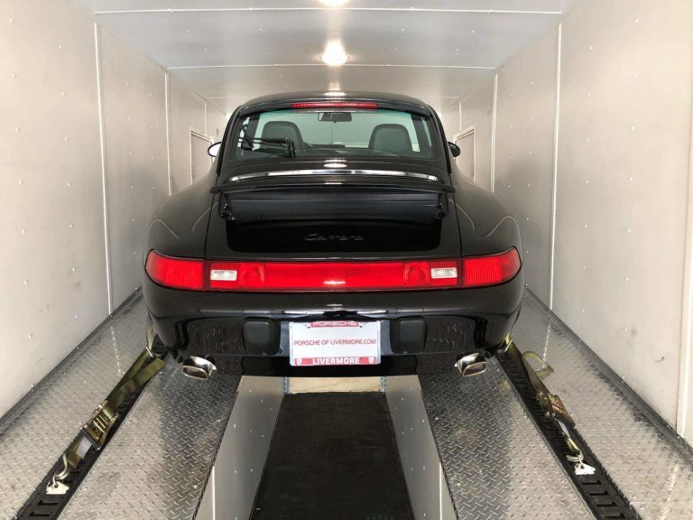classic porsche on a closed trailer