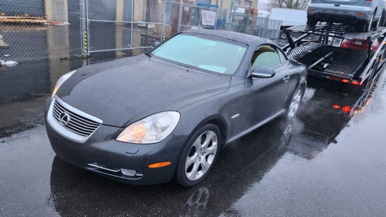 black lexus waiting to be transported
