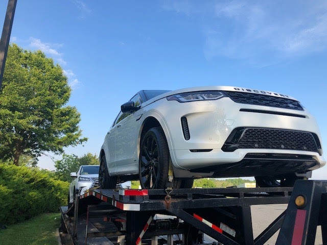 2020 land rover discovery car transport front view