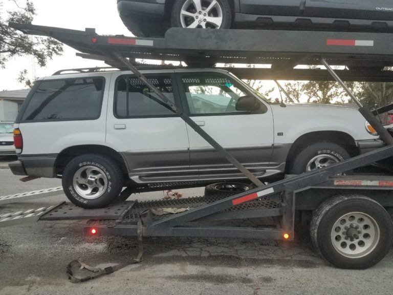Ford Explorer being loaded for car transportation
