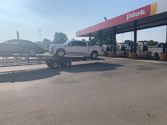 ford truck on open trailer