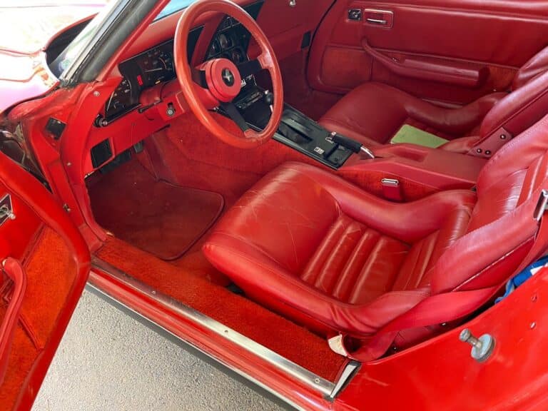 inside red corvette