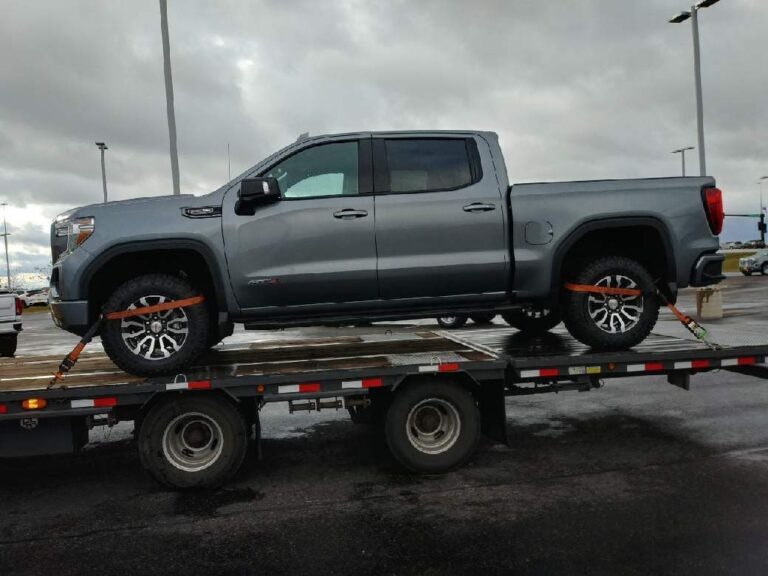 GMC truck on trailer