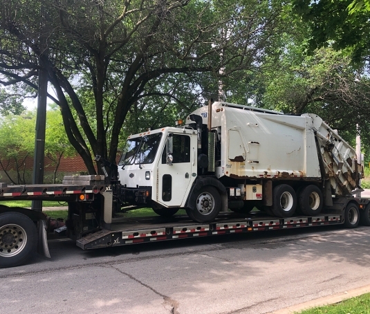 Heavy commercial truck ready for documented pickup and delivery handoff