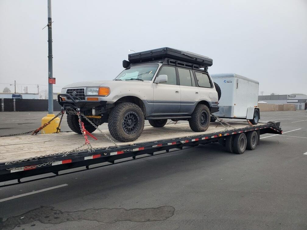 toyota off-road vehicle being hauled for wyoming drive away services