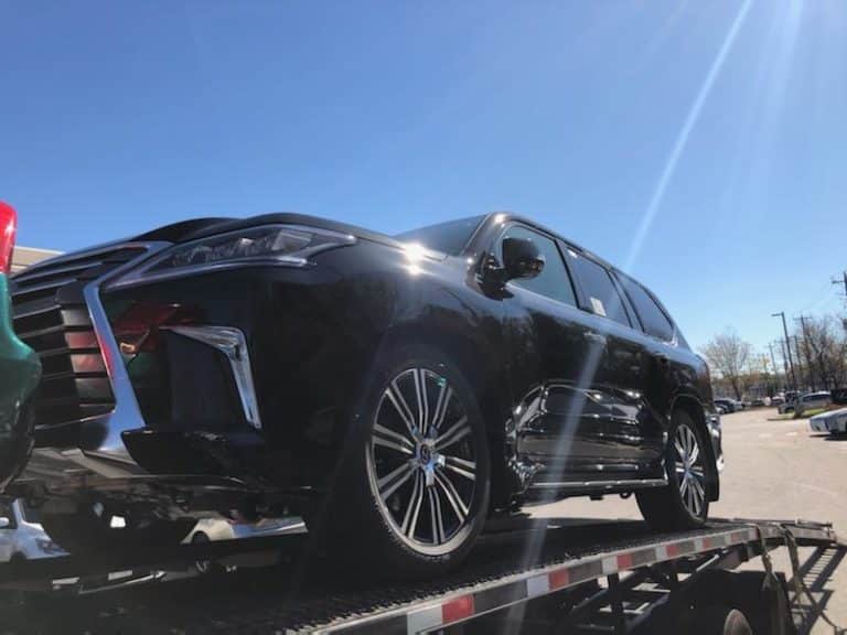 black car loaded and ready for transportation