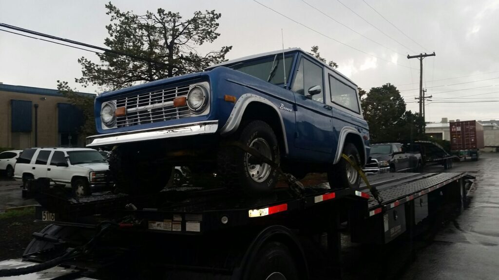 ford bronco on open trailer