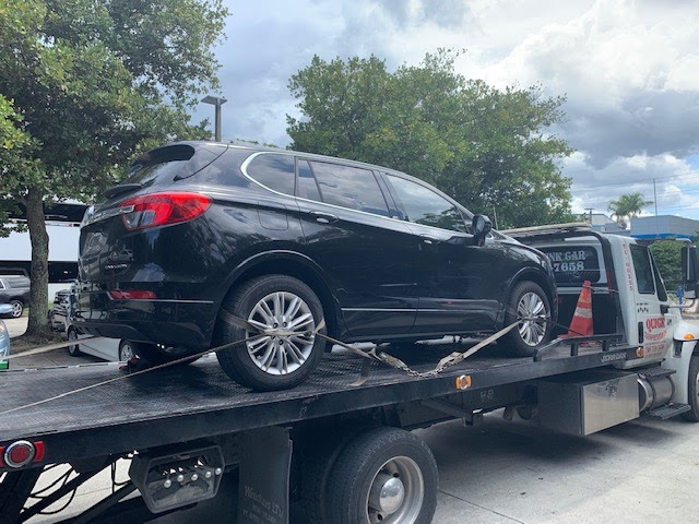 buick envision on trailer for auto transport