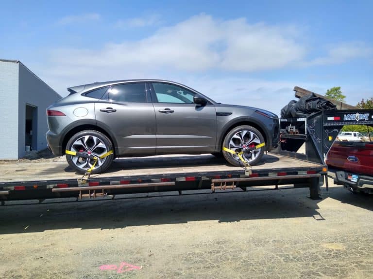 silver jauguar auto transport in summer