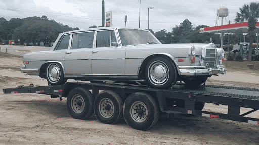 classic mercedes on open trailer