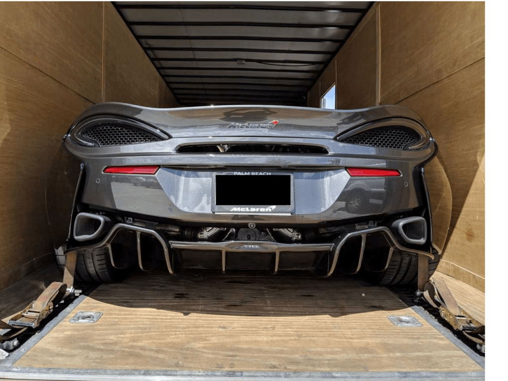 mclaren in enclosed trailer