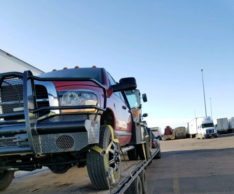 towing truck on autotransport.com's trailer for transport
