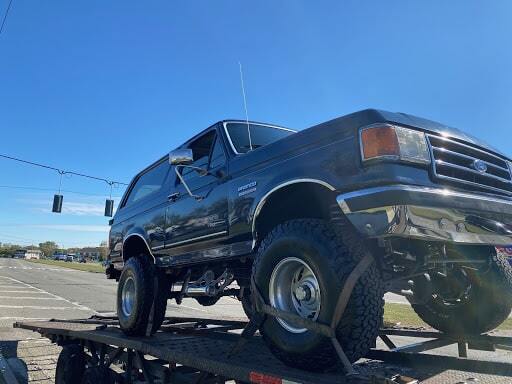 ford bronco on open trailer
