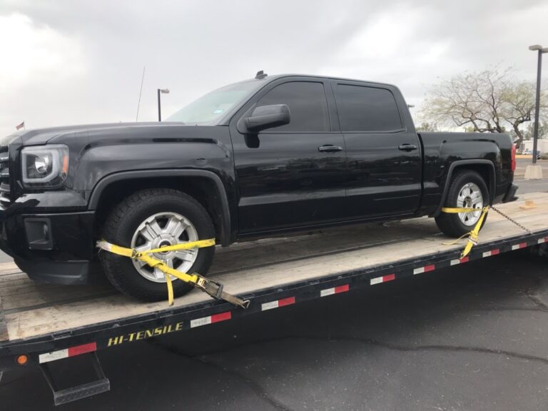 GMC Sierra on flatbed