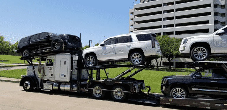 cadillac suv fleet transported by auto transport