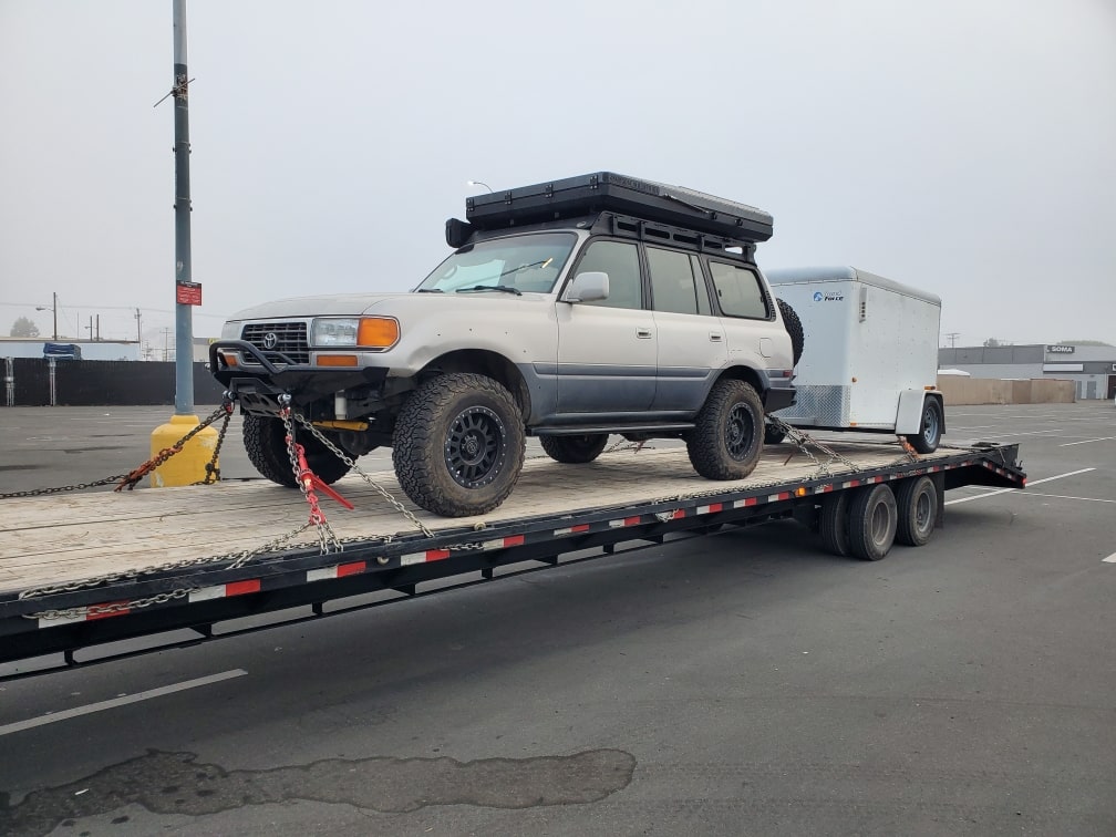 toyota off-road vehicle being hauled for wyoming drive away services