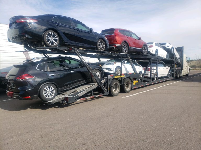 multiple vehicles on trailer for auto transport