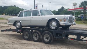 classic vintage mercedes on trailer for auto transport