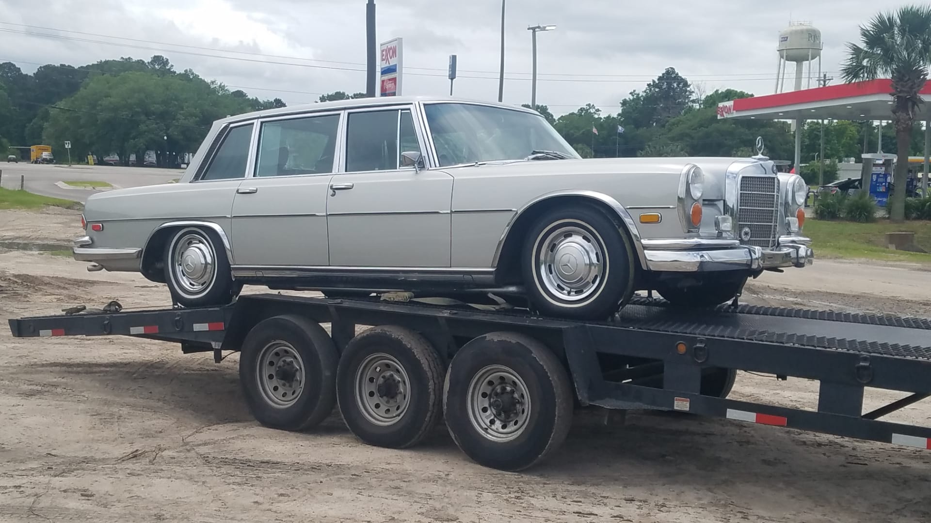 classic vintage mercedes on trailer for auto transport