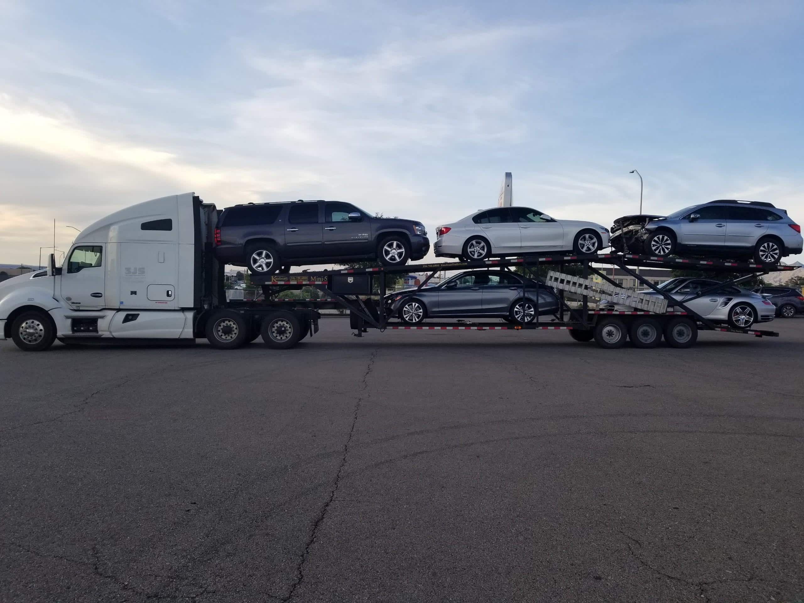 multiple vehicles on trailer for auto transport