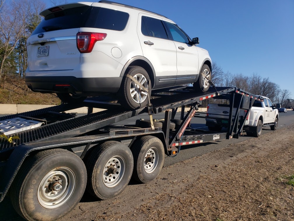 ford explorer on open trailer