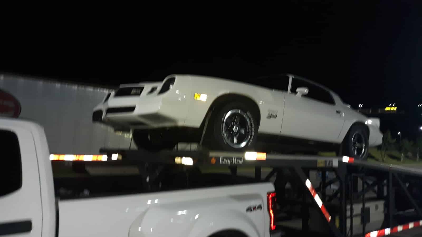 pontiac on open trailer