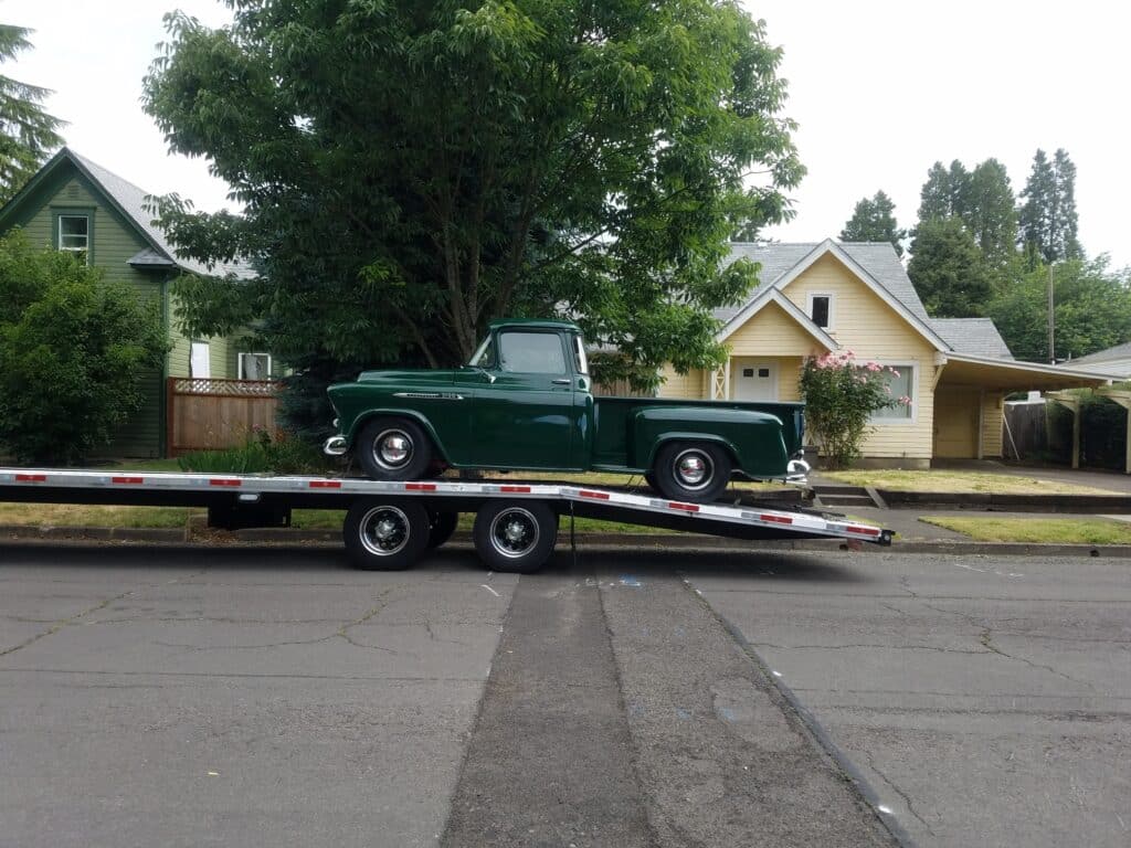 classic chevy truck on open trailer