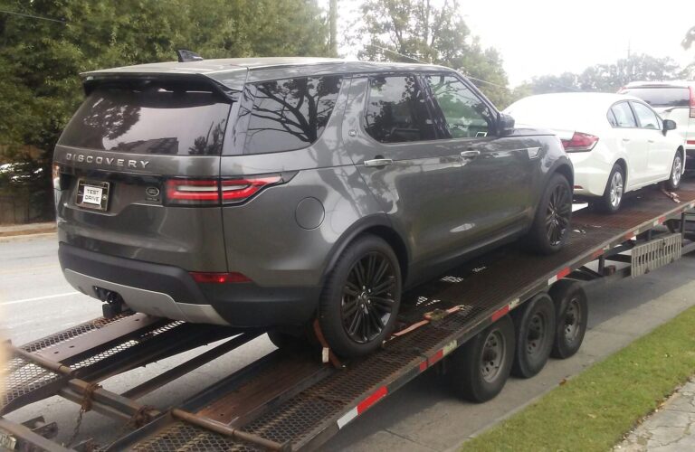 land rover on open trailer