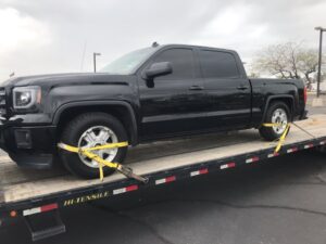GMC Sierra on flatbed