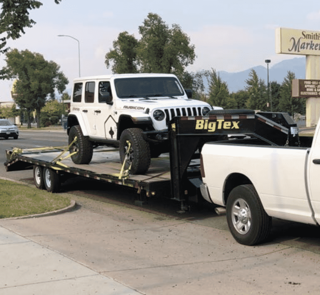 jeep wrangler on open trailer