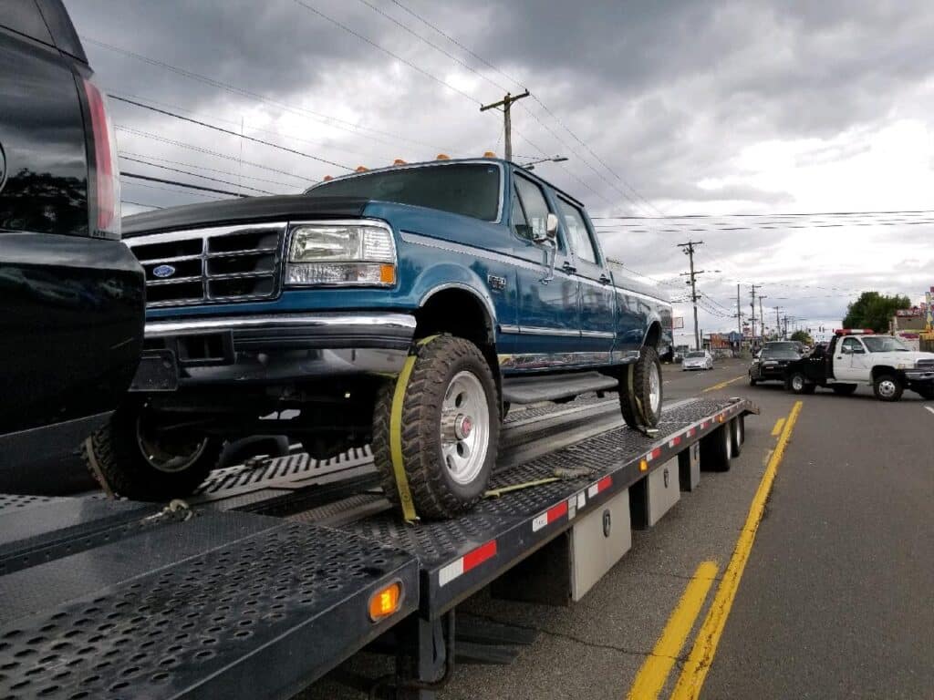 ford truck on open trailer