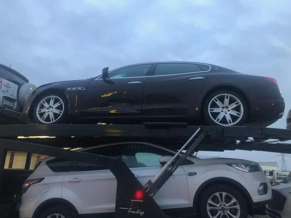 maserati on open trailer