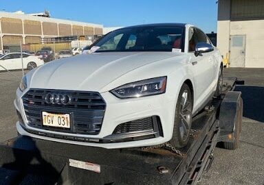 white audi on trailer