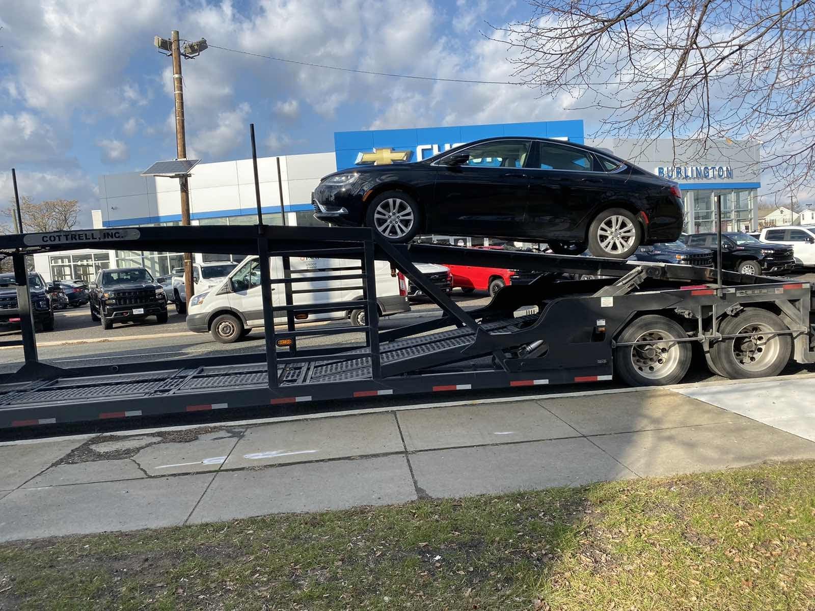 black chevrolet malibu from car dealership