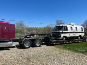 Rv being transported on a trailer