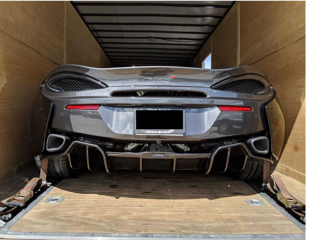 mclaren in enclosed trailer