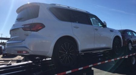 2020 infiniti QX80 SUV on trailer - back view