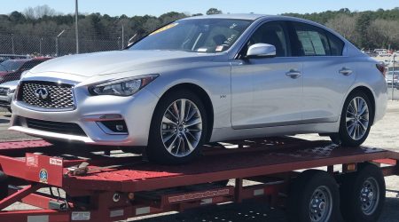 infiniti q50 on red trailer